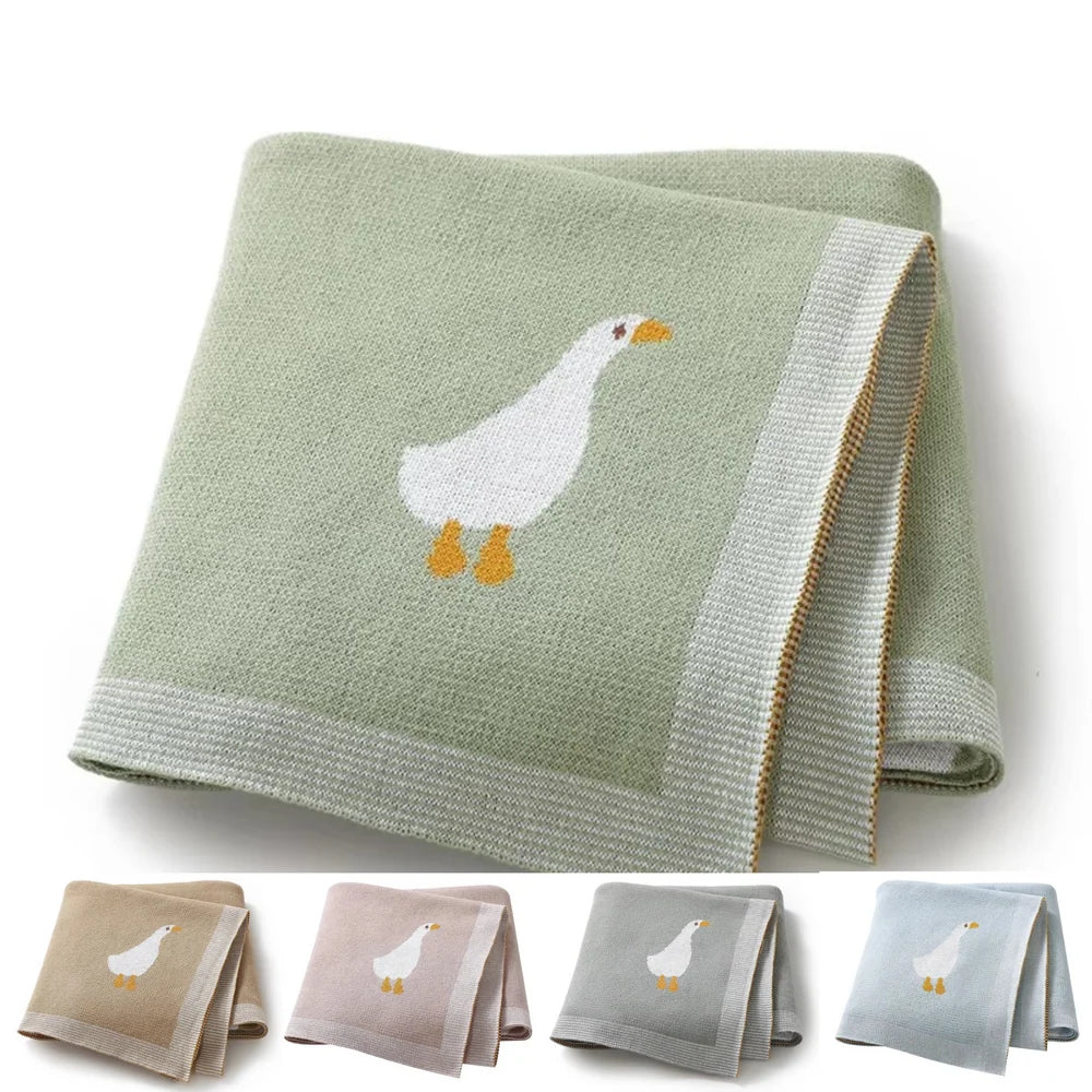 GESTRICKTE DECKE MIT GÄNSEMOTIV