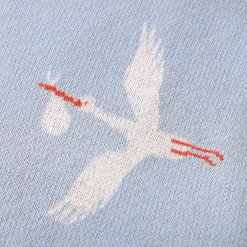 GESTRICKTE DECKE MIT KRANICHMOTIV