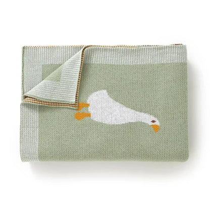 GESTRICKTE DECKE MIT GÄNSEMOTIV