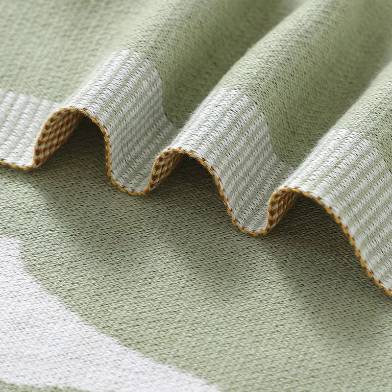 GESTRICKTE DECKE MIT GÄNSEMOTIV