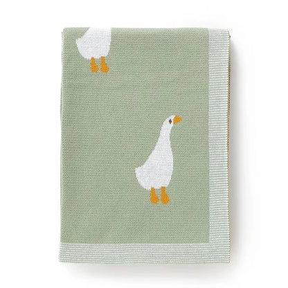 GESTRICKTE DECKE MIT GÄNSEMOTIV