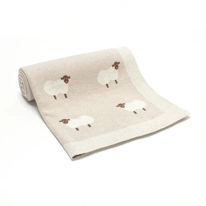 GESTRICKTE DECKE MIT SCHAFSMOTIV